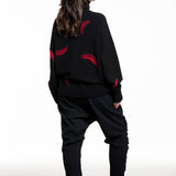 Suzusan Damen Kaschmir Rollkragenpullover Feather schwarz‑rot