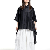 Comme des Garçons weiße Rockhose im Styling mit schwarzer Bluse