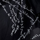Yohji Yamamoto Damen Seidenbluse mit Print schwarz Detail