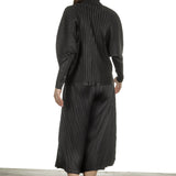 Pleats Please Issey Miyake Damen Plissiertes Langarmshirt  mit Rollkragen schwarz