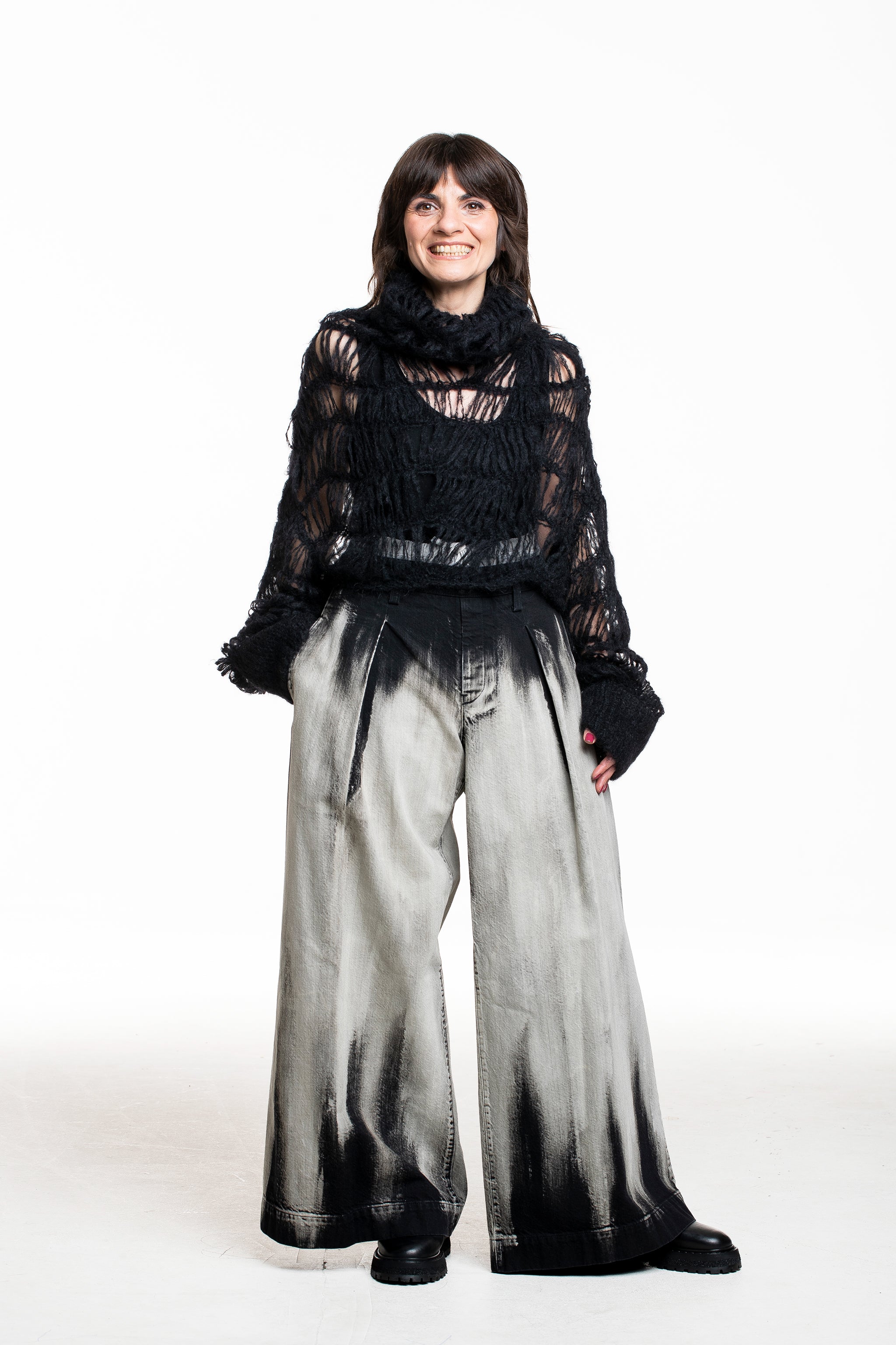 Bild‑Alt‑Texte
Yohji Yamamoto Strick‑Top hochgeschlossen schwarz